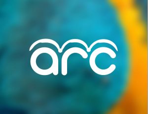 ARC logo in white against a color background to show other options on how the logo can look.